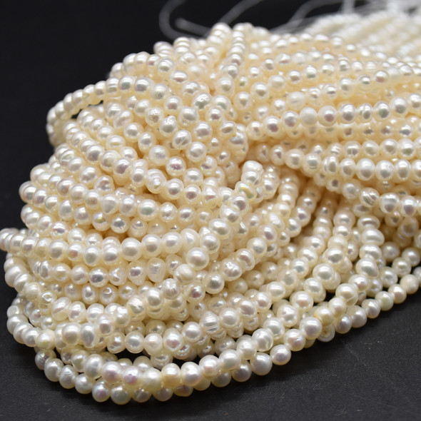 Natural Freshwater Potato Pearl Beads - White - 5mm - 5.5mm x 3mm - 3.5mm -  14" strand