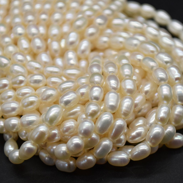 Natural Freshwater Rice Pearl Beads - White - approx 5mm - 6mm x 4mm - approx 14'' Strand