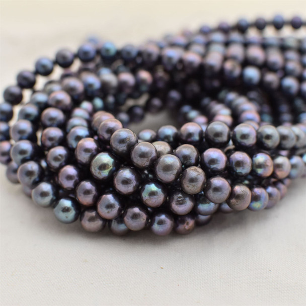 High Quality Grade A Peacock Black (dyed) Freshwater Near Round Potato Pearl Beads - approx 7mm - 8mm - 14" long
