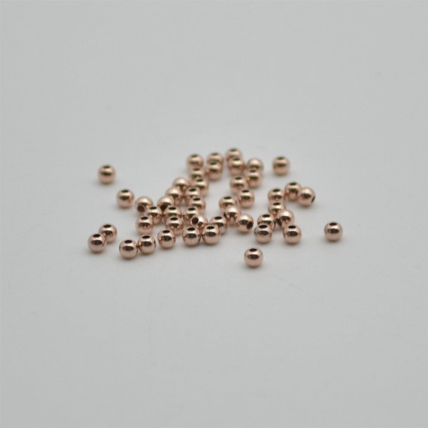 14K Rose Gold Filled Findings - 50 Gold Filled Round Seamless Spacer Beads - 2mm - 50 per pack - 0.80mm hole size