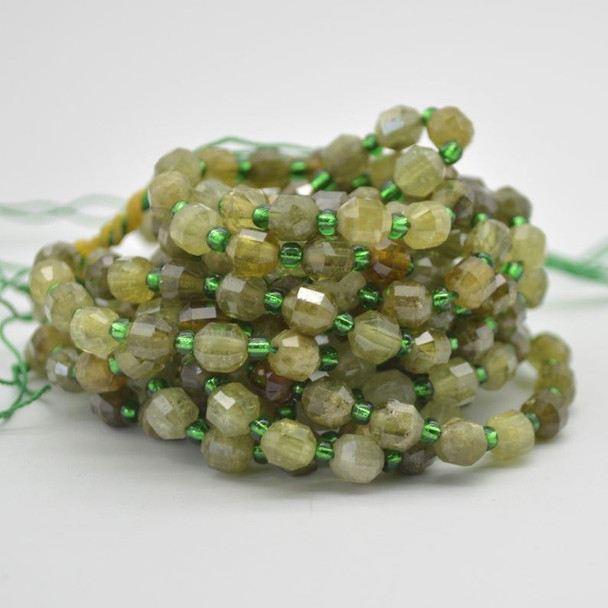 Grade A Natural Green Garnet Semi-precious Gemstone Double Tip FACETED Round Beads - 5mm x 6mm - 15" strand Grade A Natural Green Garnet Semi-precious Gemstone Double Tip FACETED Round Beads - 5mm x 6mm - 15" strand