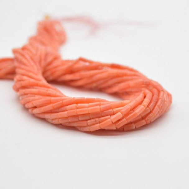 High Quality Orange Coral (dyed from natural white coral) Semi-precious Gemstone Round Tube Beads - 4mm x 2mm - 15" strand