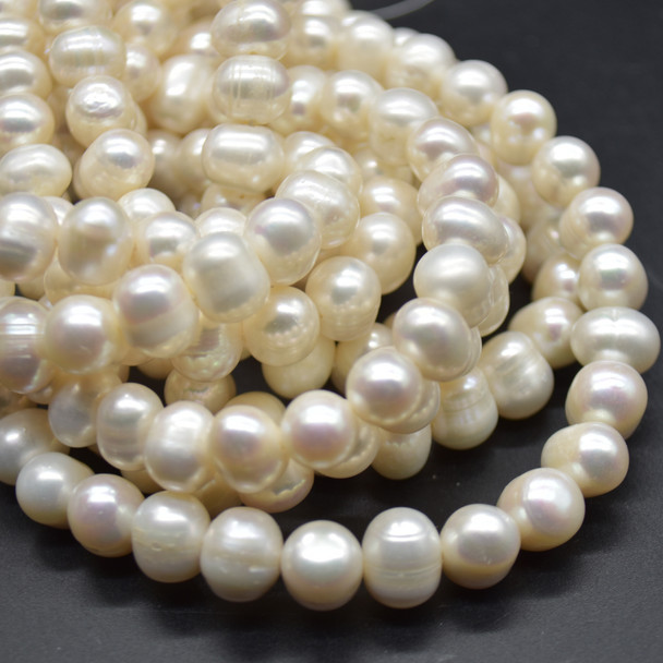 Grade B Natural Freshwater Irregular Rice Pearl Beads - Off White - 10mm - 11mm - 14.5" strand