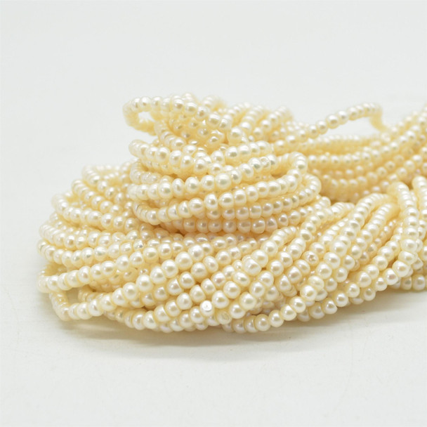 High Quality Grade A Natural Freshwater Potato Round Pearl Beads - Off White -   3mm - 5mm - 14" strand