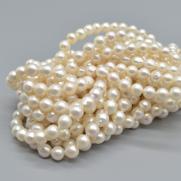 High Quality Grade A Natural White Freshwater Baroque Irregular Raindrop Teardrop Pearl Beads - 6mm - 9mm x 5mm - 7mm - 15'' Strand