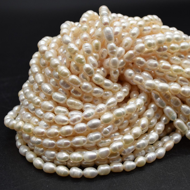 Natural Freshwater Irregular Rice Pearl Beads - Off White - 6mm - 8mm - 13.5'' Strand
