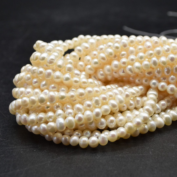 Natural Freshwater Potato Shaped Pearl Beads - Off White - 5mm x 4mm - 14'' Strand