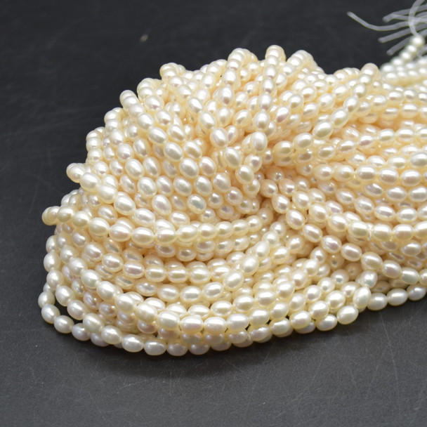 Natural Freshwater Rice Pearl Beads - White - 5mm - 6mm x 4.5mm - 5mm - 14.5'' Strand