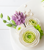 Example of a Cake you can create using the white floral bud spray with the additional of other floral pieces.