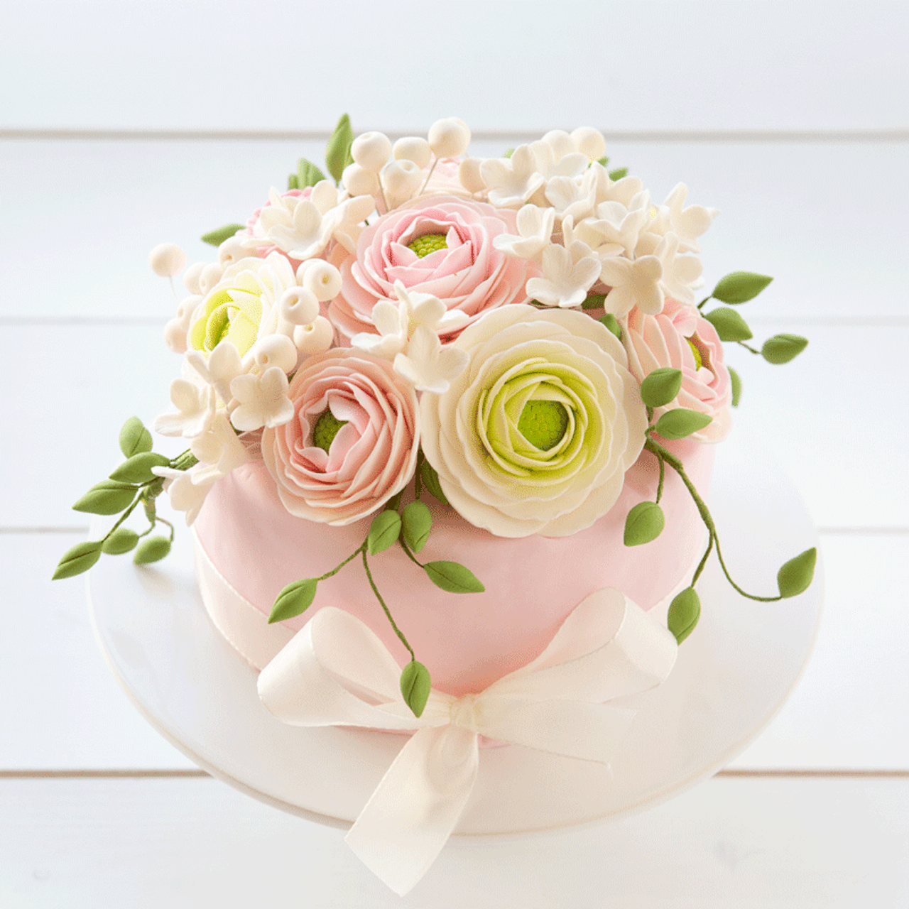 Example of a Cake you can create using the Ranunculus with the additional of other floral pieces.