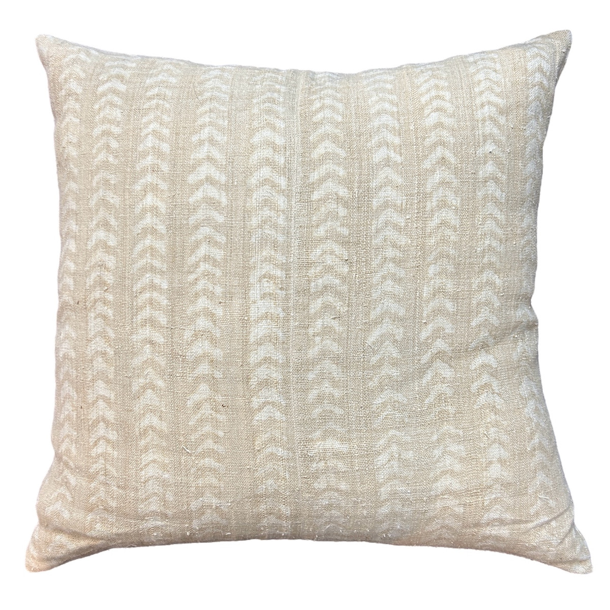 Handwoven and handspun hemp pillow. The pillow is block printed with a very subtle chevron pattern.  90/10 feather down insert, hidden zipper. Shades of cream to sand.