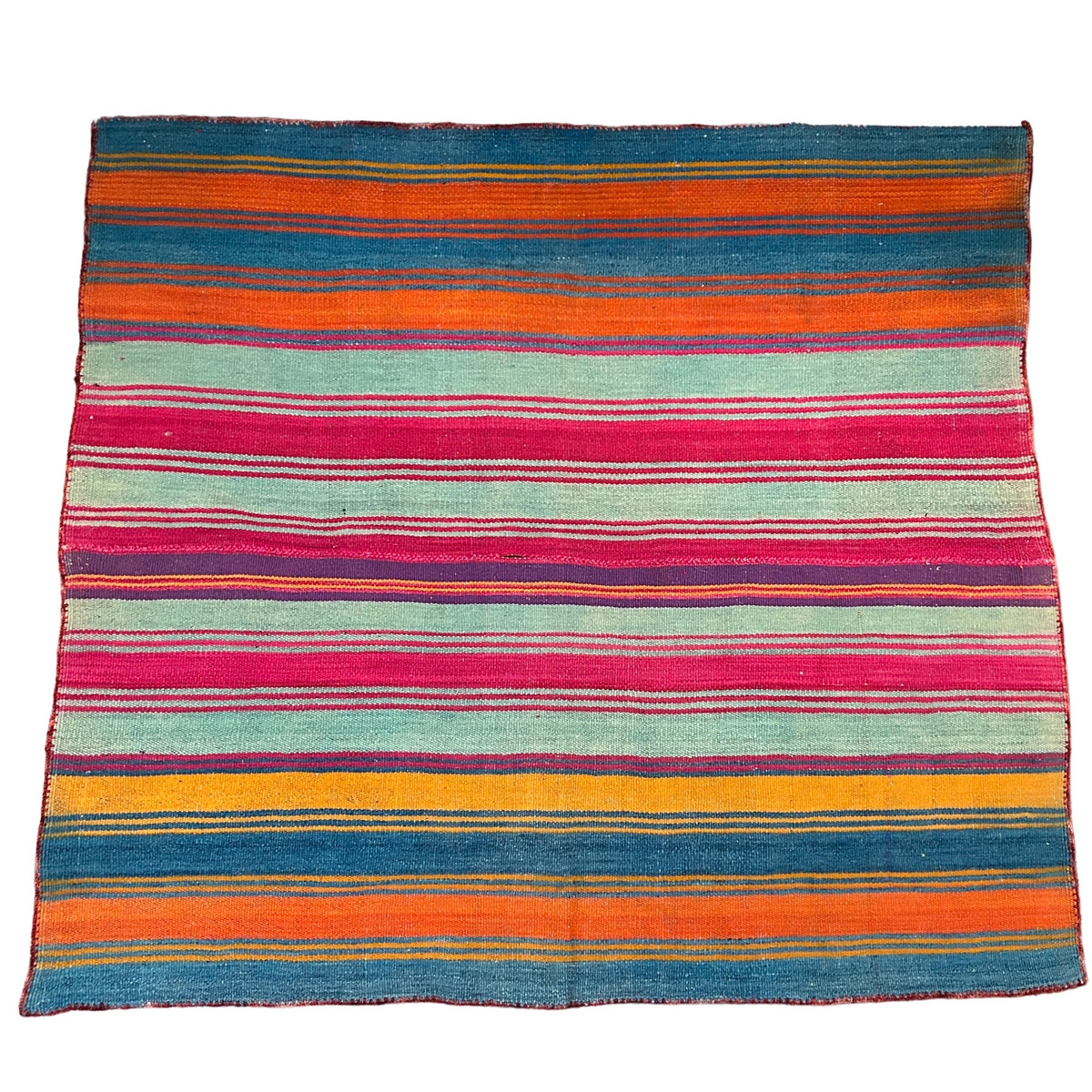 Our new collection of vintage hand woven wool frazadas are stunning!n   Hand woven in two panels from the mountains of Peru used by the Aymara or Quechua people that live in the high Andes. This is a heavier throw but beautiful draped on the couch or the foot of the bed. This would also be beautiful on the wall. Vintage condition with some minor spots or discolorations. 100% wool. Colors: teal blue, burnt orange, seafoam, purple and old gold. There is a mottled brick colored crocheted edge around the whole blanket.