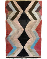 Handwoven rag rug with a dynamic pattern of large diamonds and broad stripes, from weavers in southern Morocco. Beautiful on the floor or on the wall. Colors: black, brown, shades of light pink,  light blue, robins egg blue,  shades of off- white to tan, coral, pink and more.