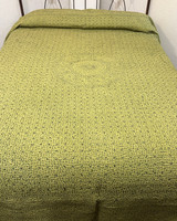 Solid colored cotton hand stitched coverlet. Bright olive colored cotton with a fine black stitched pattern. The different stitching patterns gives an added dimensional quality and the solid cloth takes on different hues.  India