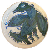 Handmade earthenware platter by Ivan Bobkob. Ivan's food-safe pottery is decorated with bird imagery, a triumphant symbol for Ukrainians representing freedom, rebellion and determination.  Ivan’s pots are painted with birds and Ornek ornamentation, a system of specific symbols embedded with meaning and used by the Crimean Tartar communities. Ornek ornamentation is applied to wood working, weaving, pottery glass, wall paintings and jewelry. (Ornek ornamentation has been placed on the National List of Elements of the Intangible Cultural Heritage of Ukraine.) The cream colored plate has a whimsical bird. Colors:  muted teal, evergreen, periwinkle blue, Prussian blue and charcoal. 