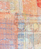 detail Hand stitched cotton pillow. We purchased this quilt from India and then took it to Guatemala where the women of UPAVIM made it into a pillow.  The front is several layers thick and worn through giving a beautiful patina. The pillow has fine rows of stitching that secures  the fabric layers and giving a nice texture. Colors: a painterly range of papaya to peach, pale periwinkle blue,  pale yellow, off-white, red orange, pale green and more.. The back is a pale greyish tan colored cotton suede cloth. 90/10 feather/down pillow insert. Hidden zipper. Very versatile pillow! 

