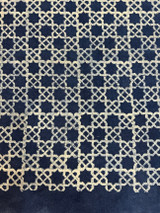 detail Block printed pattern onto a sturdy cotton canvas rug. Easy care and casual living. Purchased directly from the Gujurat studios of Sufiyan Khatri, an internationally acclaimed expert in natural dyed block printing. The design is block printed using several wooded blocks and dyed with natural dyes.  Colors: deep indigo blue. and off-white. 100% cotton.  This canvas will withstand a lot of wear. Read more about Sufiyan Khatri's workshop on our blog.
Details: