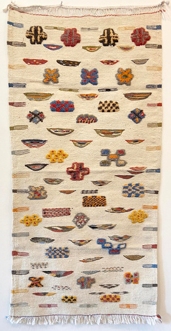 Handwoven Ahknif White  Morocco (27" x 55") Colors: the field is a medley of natural whites with accents in dusty rose, sky blue, medium grey, saffron, bronze, green, melon, bear brown and more.

