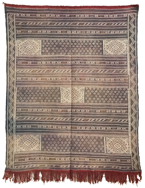 Vintage Zemmour style flat woven wool rug from a weaving cooperative outside of Marrakech. Colors: a variegated grey-puce and cream with hints of the deep red