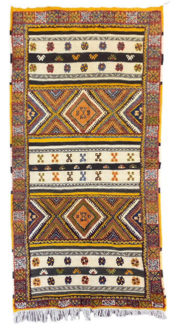 Glaoui style rug from a weaving cooperative in southern Morocco. Colors: medium indigo, pumpkin, saffron, cream, chocolate brown, olive, blue grey and more.