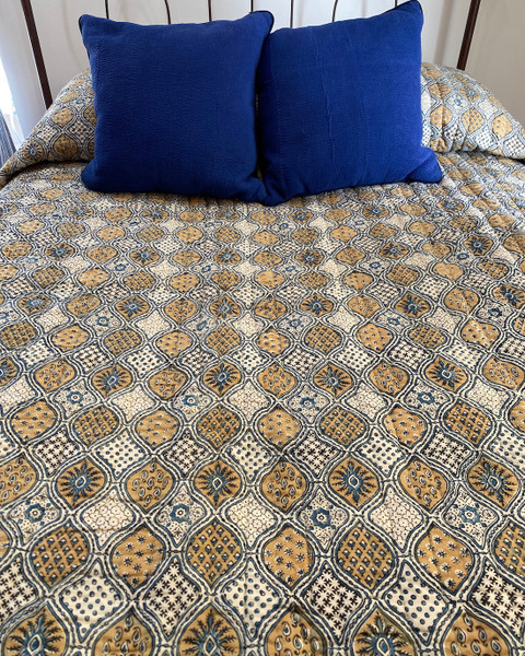 Handmade Natural  Dyed Block Print Quilt Queen  Bedspread India  The design is block printed using several wooded blocks and dyed with natural dyes. Colors: mustard, charcoal and indigo blue on a cream background. 100% cotton. The back is a indigo blue color.