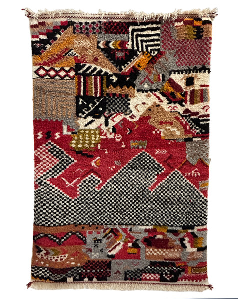 Hand woven hand knotted pile rug from a weaving cooperative in southern Morocco. Long-wearing and one-of-a-kind. 100% wool.  Colors: red, cream, black, camel, burgundy, grey, pumpkin, olive, light terra cotta and more. Beautiful on the floor or on the wall.