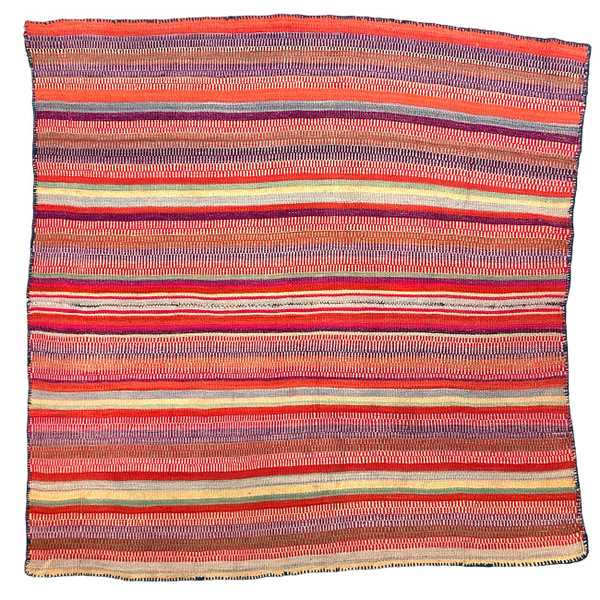 Our new collection of vintage hand woven wool frazadas are stunning!  Hand woven in two panels from the mountains of Peru used by the Aymara or Quechua people that live in the high Andes. This is a heavier throw but beautiful draped on the couch or the foot of the bed. This would also be beautiful on the wall. Vintage condition with some spots or discolorations. 100% wool. Colors: red, magenta, fuchsia, faded indigo, faded teal, light sand and more. There is an evergreen colored crocheted edge around the whole blanket.