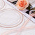 bUCLA 100PCS Clear Rose Gold Plastic Plates Disposable - Heavy Duty 6.25 Inch Clear Plastic Dessert Plates with Rose Gold Trim - Ideal for Party & Wedding