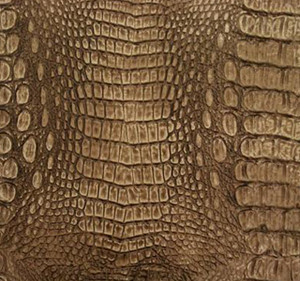JJ WILD CROC Bronze Vinyl 56" - Sold by the CONTINUOUS YARD! JJ WILD CROC Bronze Vinyl 56" - Sold by the CONTINUOUS YARD!