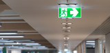 How can I save money on my emergency and exit lighting?