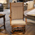 An Amish-made swivel gliding rocking chair. Maple and fabric