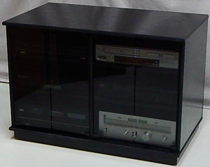 27" entertainment center with gray glass doors. Shown in black oak.
https://decibeldesigns.com 805.331.8506