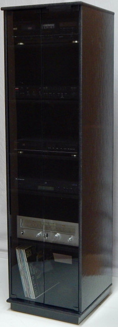 Audio cabinet 73 inches high with gray glass doors shown in black oak finish. 
https://decibeldesigns.com   808.331.8506  