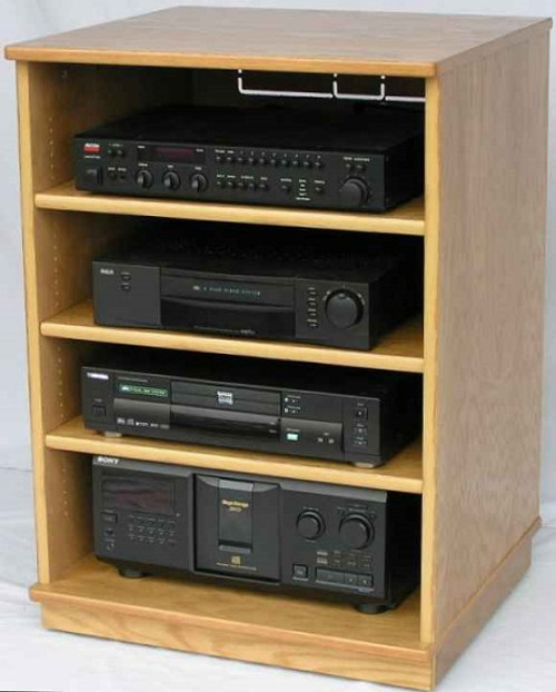 Tv stand 33 inches high with three adjustable shelves. Shown in light brown oak finish. https://www.decibeldesigns.com 805.331.8506