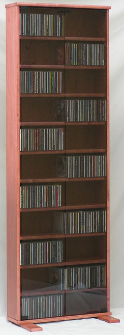 DVD rack 72 inches high with gray tempered glass doors. Shown in Maple with Minwax Sedona Red finish 805.331.8506decibeldesigns.com