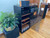 Customized black 50" narrow stereo cabinet with contrast finished shelves and full width glass door. Contact us for a quote.
https://www.decibeldesigns.com  telephone 805.331.8506