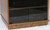 Stereo rack 27" high with glass doors bottom trim hides six dual wheel casters. Shown in Minwax Special Walnut stain color and gray tint tempered glass doors.  2 adjustable shelves standard.  http://www.decibeldesigns.com 888.850.5589