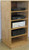 Stereo cabinet 50" high shown in natural oak.Side view.  Shown in natural oak with satin sheen top coat. http://www.decibeldesigns.com 888.850.5589