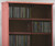 Top view of DVD Rack with Glass Doors 72" High. Shown in Minwax Sedona Red on Maple with gray tint tempered glass doors. telephone 805.331.8506 web site decibeldesigns.com