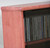 Top corner detail view of DVD Rack with Glass Doors 72" High. Shown in Minwax Sedona Red on Maple with gray tint tempered glass doors. telephone 805.331.8506 web site decibeldesigns.com