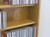 DVD rack 72" high comes with 10 adjustable shelves. Light brown oak finish shown.
888.850.5589 decibeldesigns.com