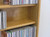 DVD rack 72" high comes with 10 adjustable shelves. Light brown oak finish shown.
805.331.8506 decibeldesigns.com