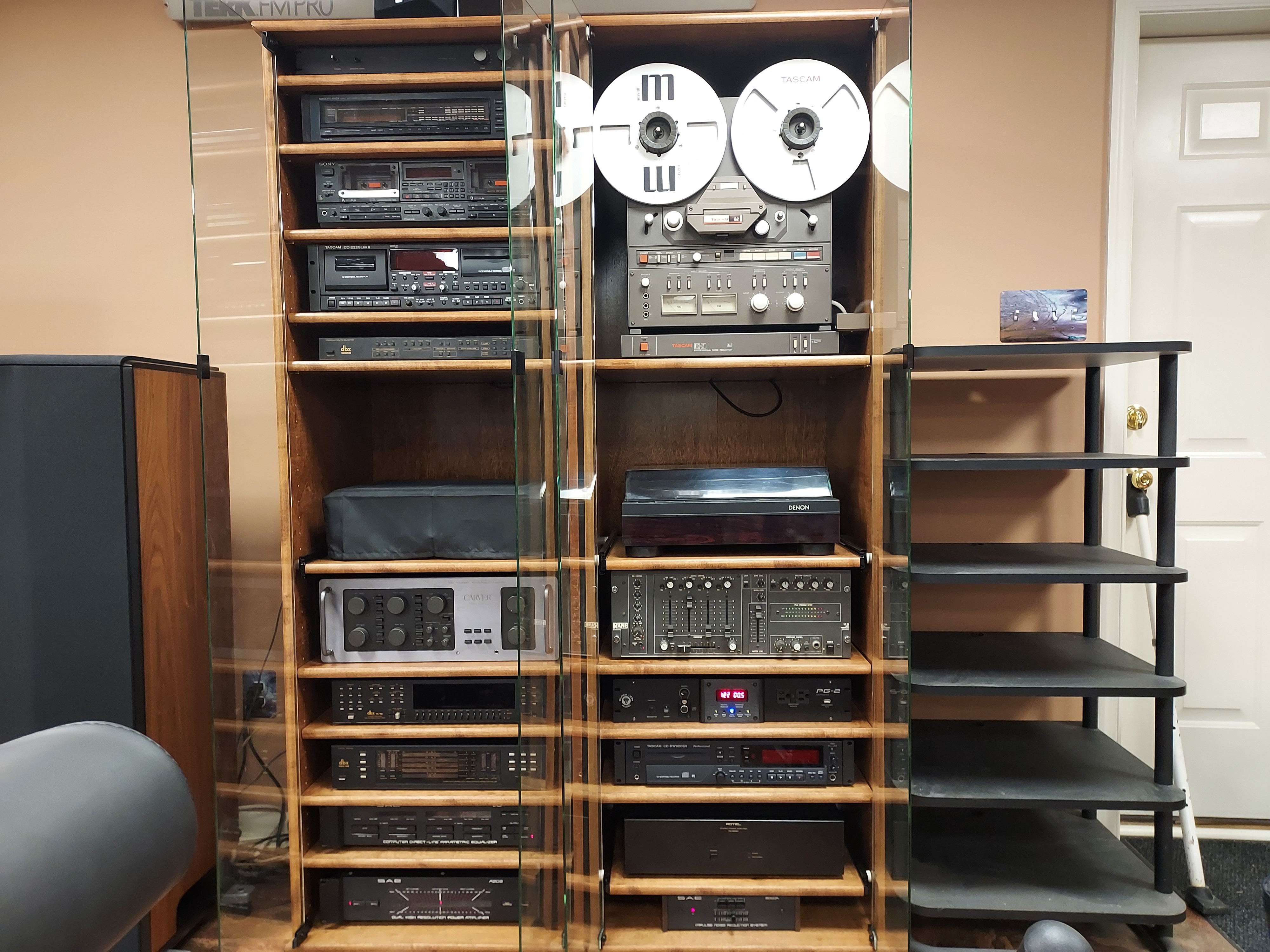 A pair of SC2272 stereo cabinets in English Chestnut on oak with clear glass doors. A pair of SC2272 stereo cabinets in English Chestnut on oak with clear glass doors.
