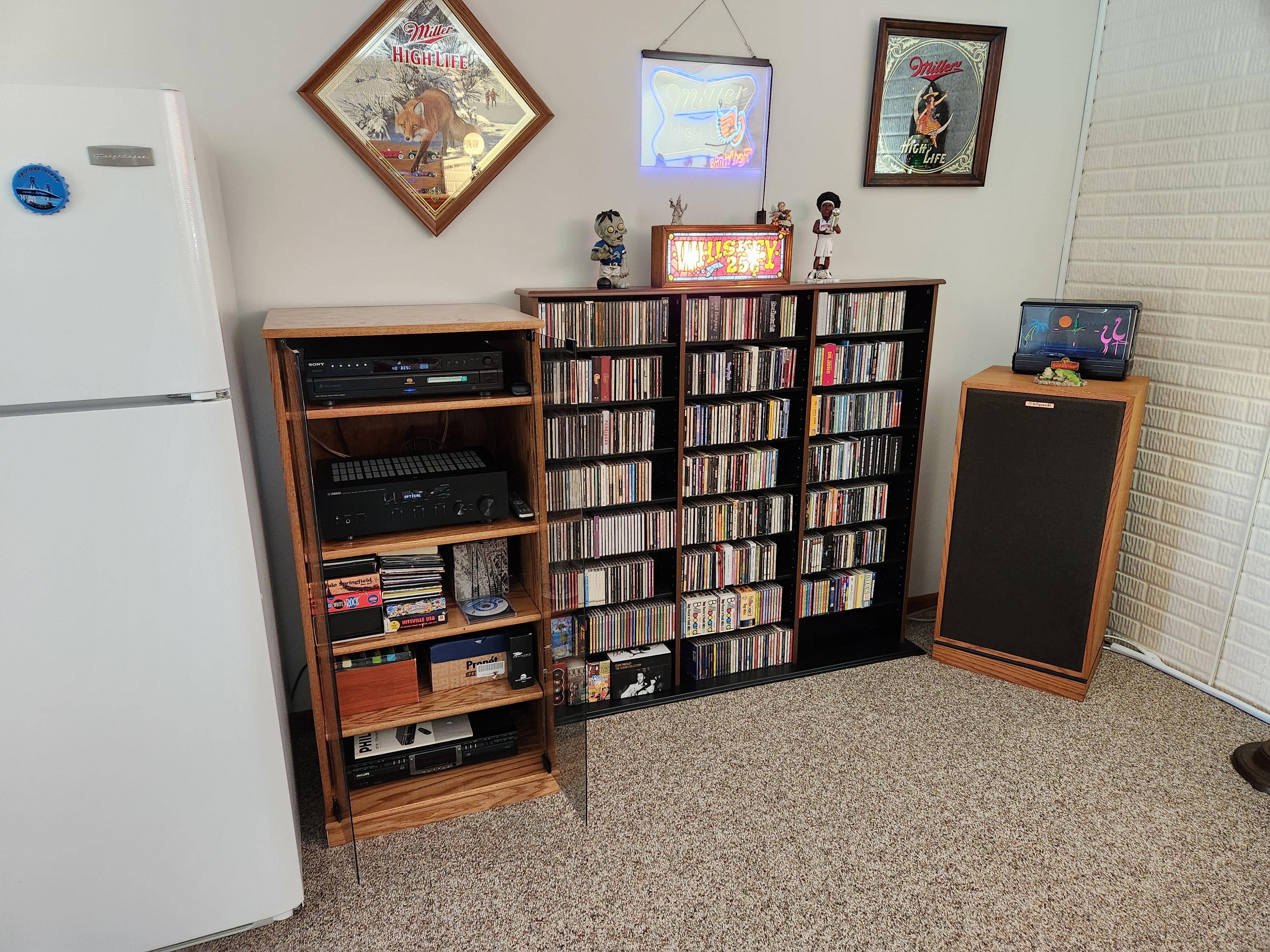 Craig's SC2248 with gray glass doors in Minwax Special Walnut finish. Next to it is a custom DVD/CD cabinet in Special Walnut and black finish. Looks great!