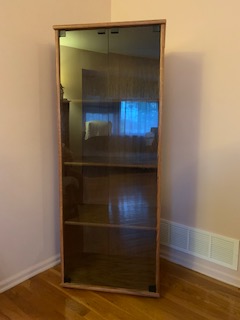 60 inch high by 23 inch wide LP cabinet with closed glass doors decibeldesigns.com