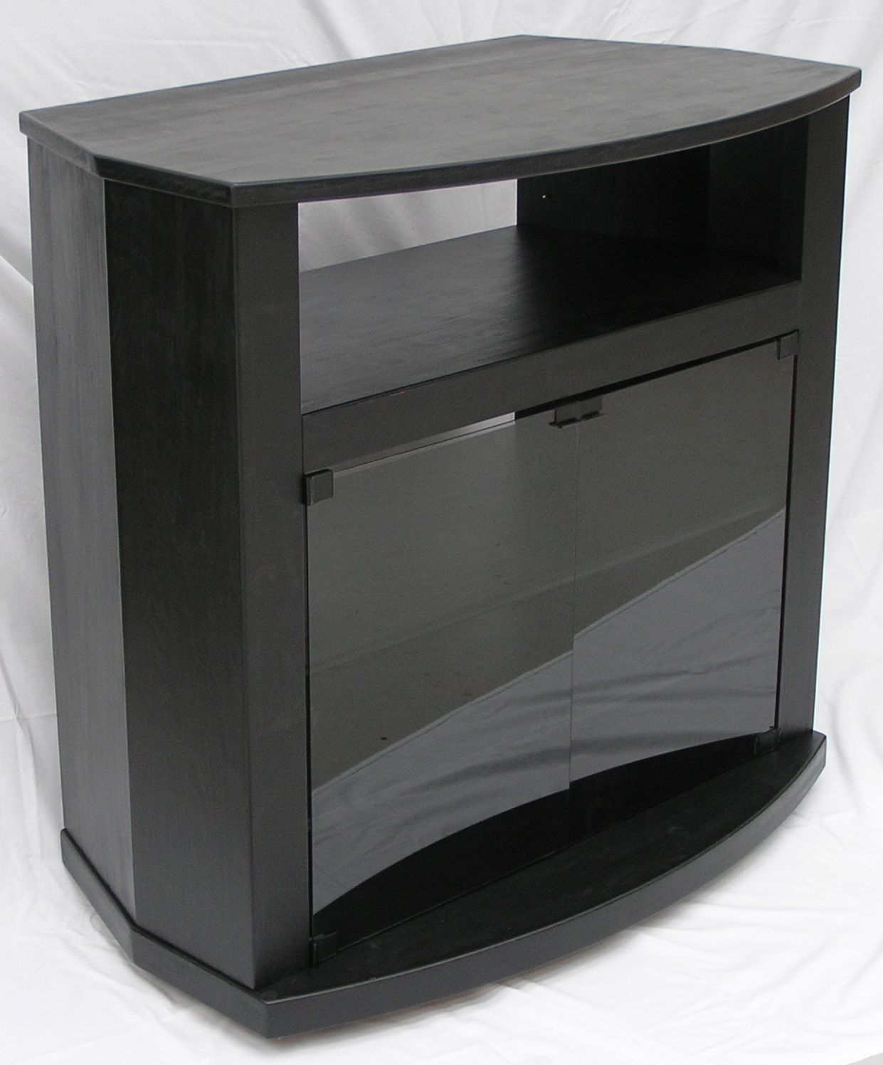 Bowfront black stereo cabinet with faceted sides by decibeldesigns.com