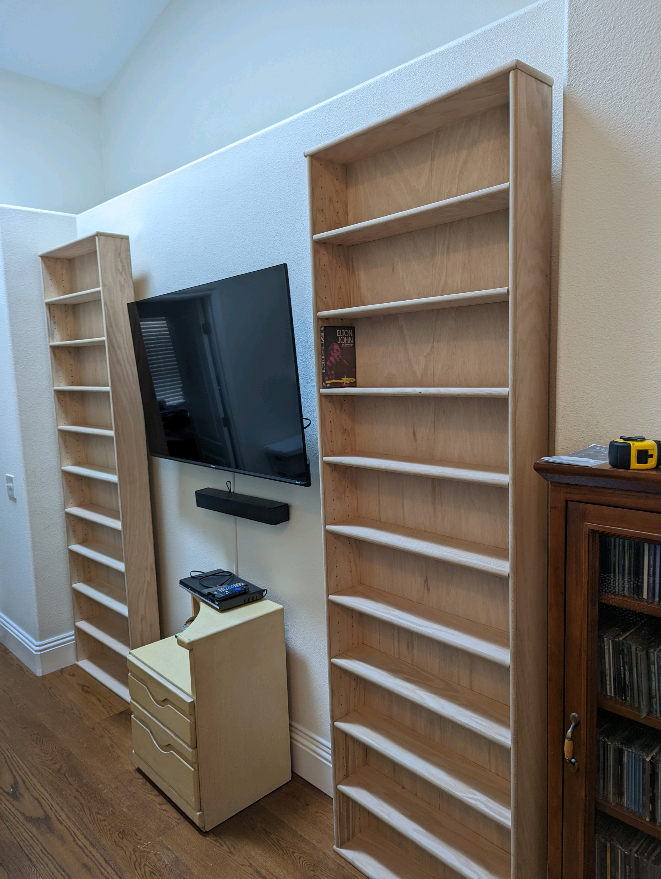 custom unfinished oak 28x90 DVD cabinet. Decibel Designs hand built.