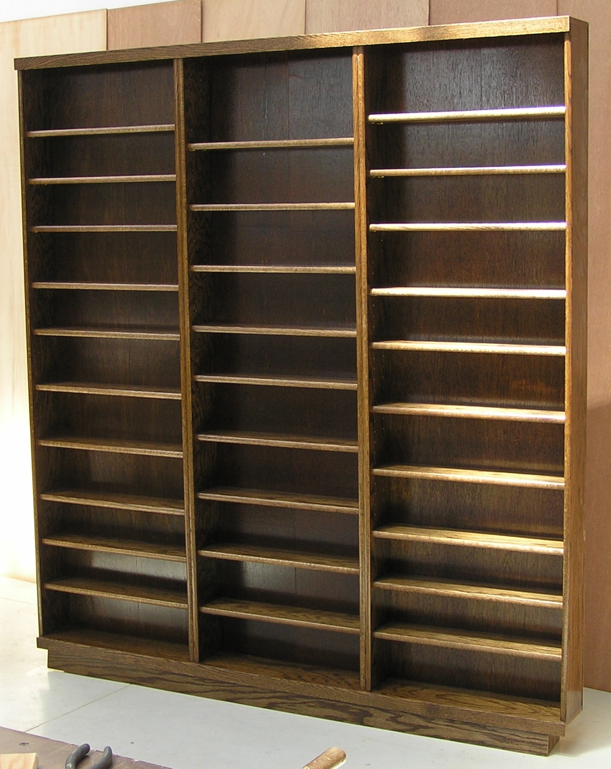 dark-walnut-triple-dvd-cabinet.jpg by decibeldesigns.com adjustable shelves