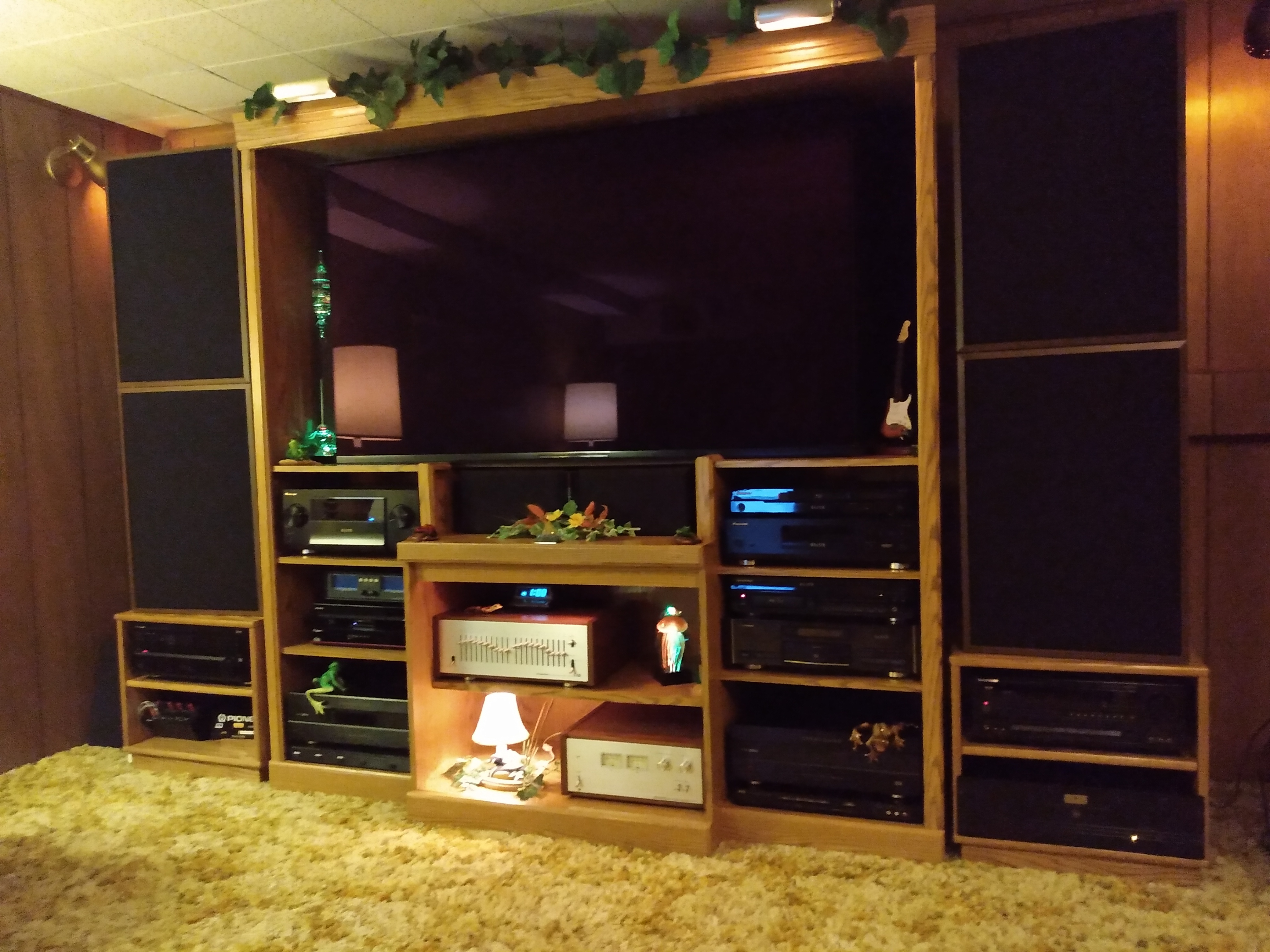 Complete widescreen media wall in Golden Oak.