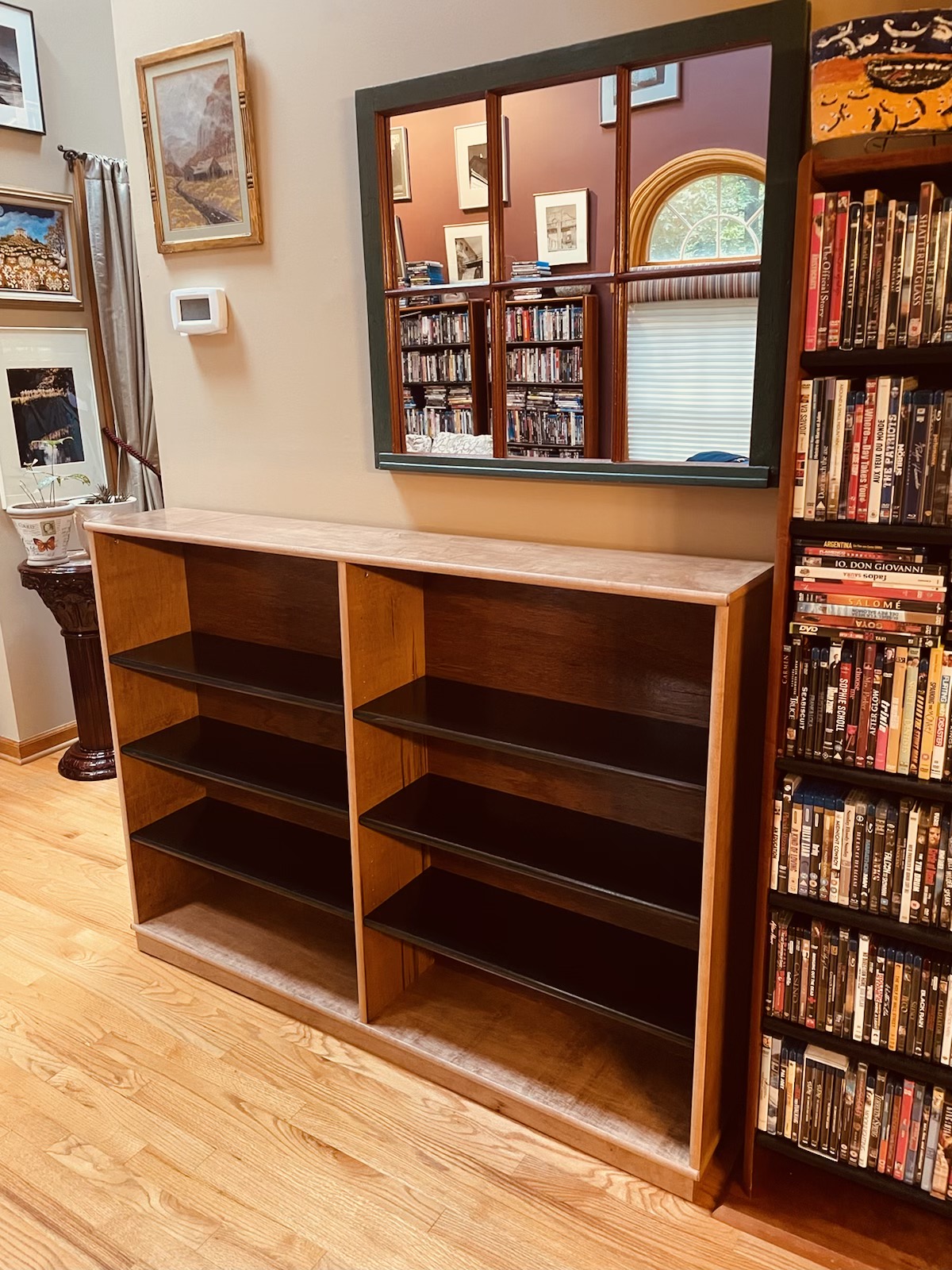 maple dvd cabinet with Minwax Cherry stain and black shelves.